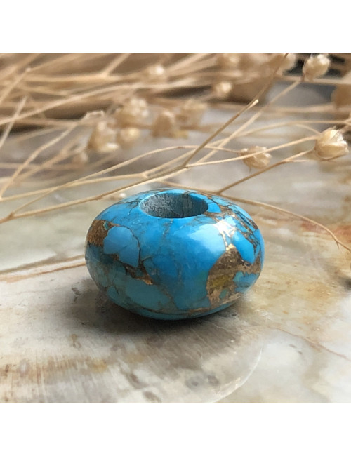 Perle en pierre véritable avec un large trou pour création de bijoux.