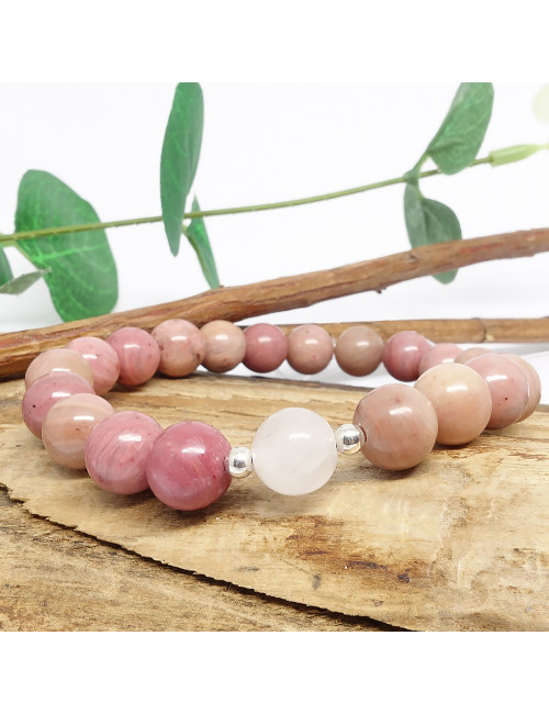Les pierres de rhodonite et de quartz rose améliorent les liens affectifs. Aident à nettoyer les blessures émotionnelles.