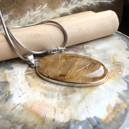 Pendentif en argent 925 et quartz rutilé.
